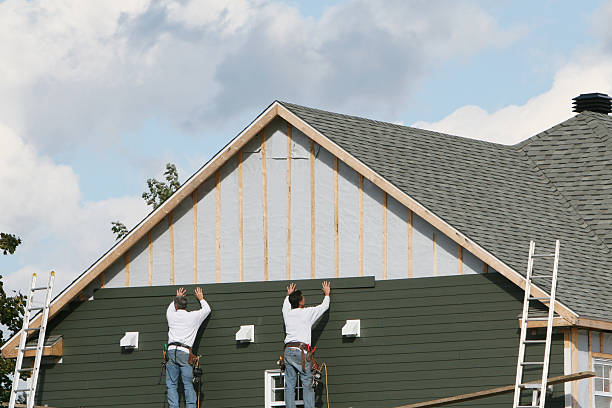Professional Siding Contractor technician working in Charlestown, IN